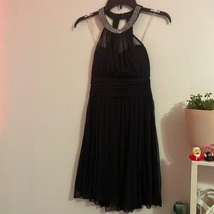 Black dress with keeled halter neck
